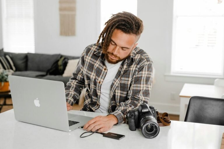 photographer laptop website portfolio working