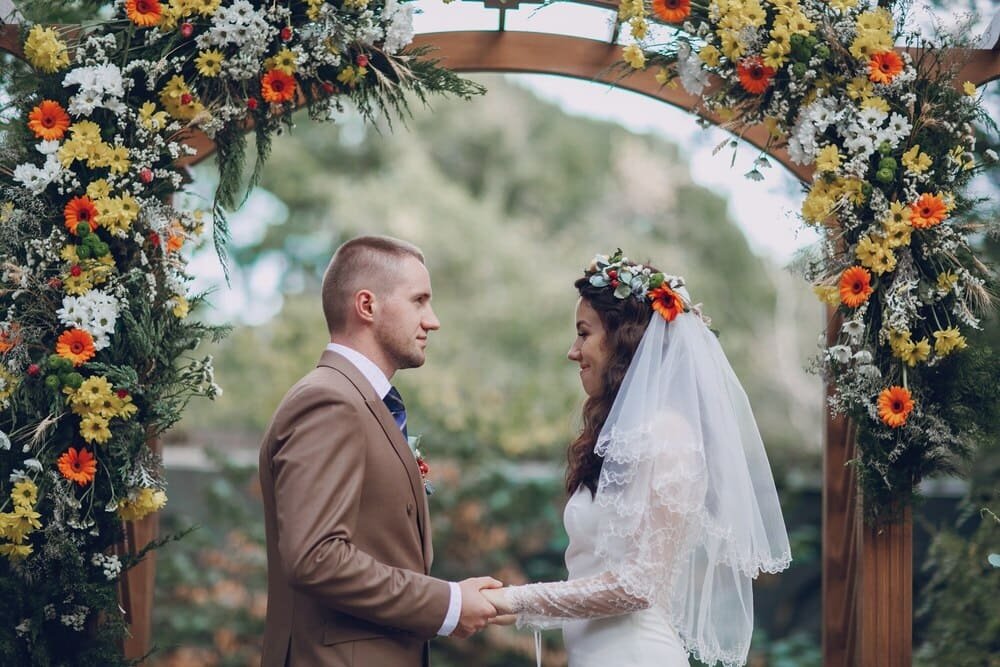 wedding ceremony photography candid couple altar light