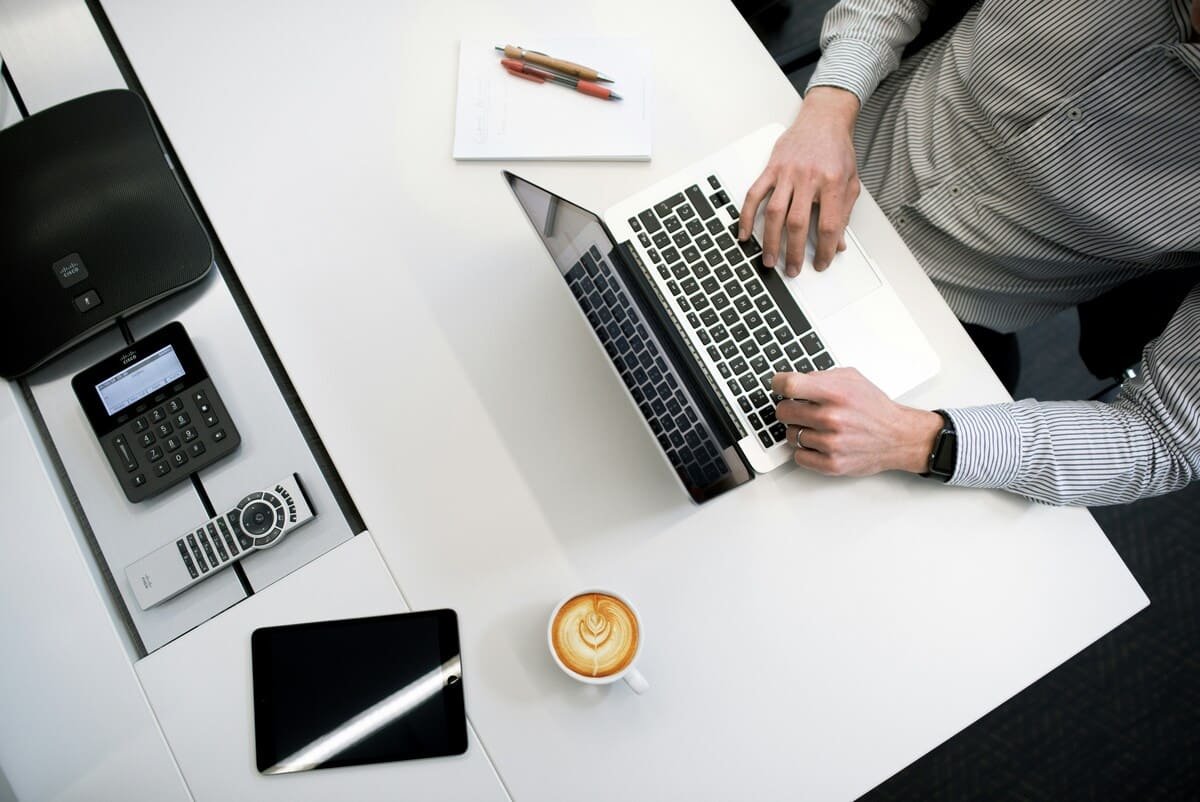 photographer business finances laptop desk planning