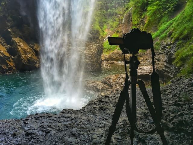photographer tripod waterfall long exposure (1)