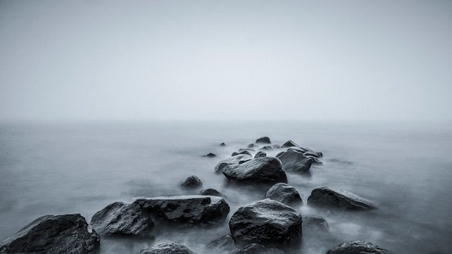 seascape long exposure misty ocean rocks